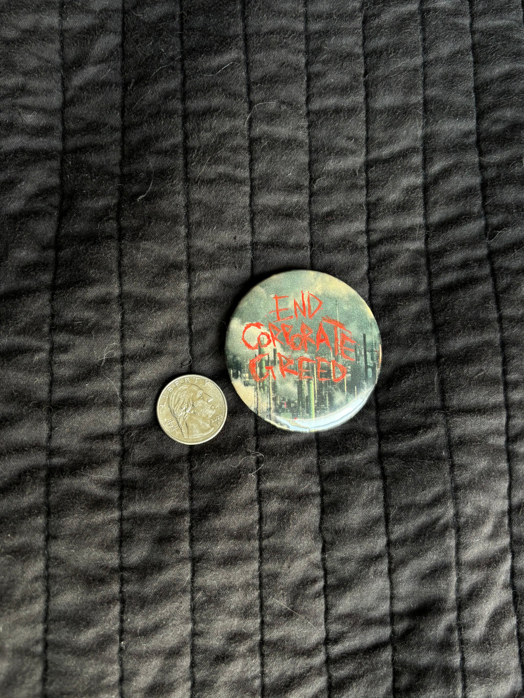 end corporate greed 2.25” pin
