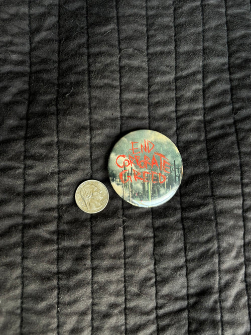 end corporate greed 2.25” pin